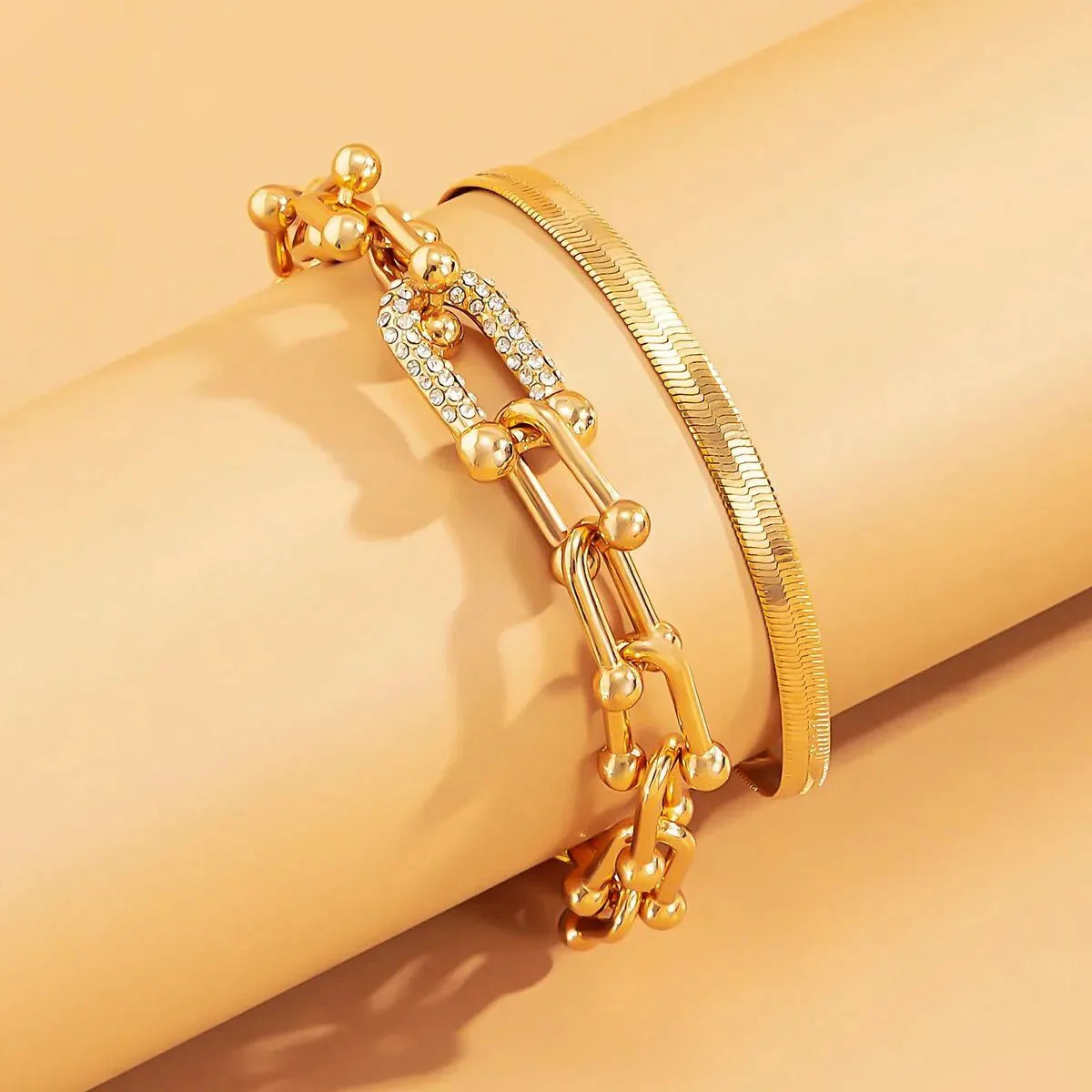 Duo bracelets chevron et cadenas dorés
