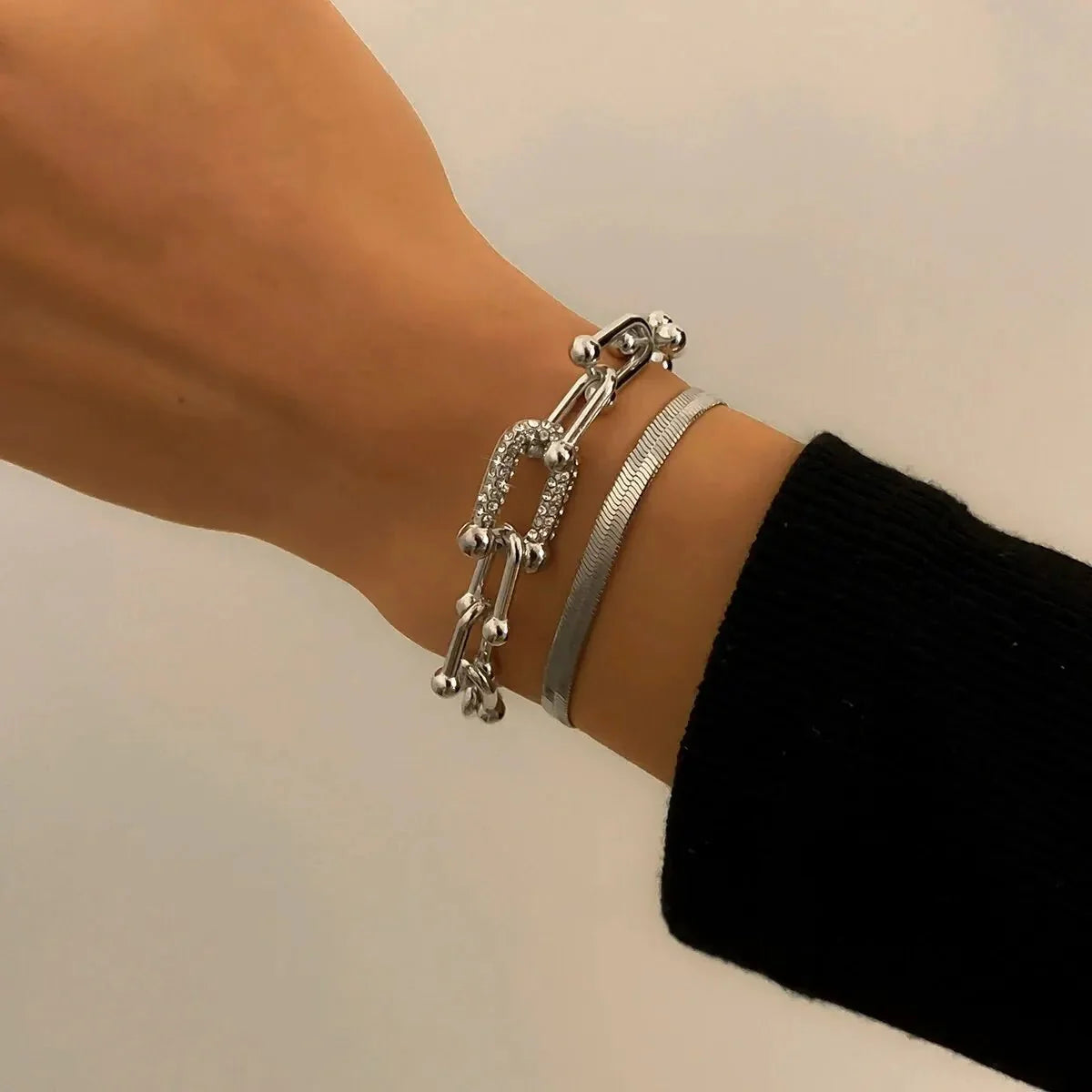 Duo bracelets chevron et cadenas dorés