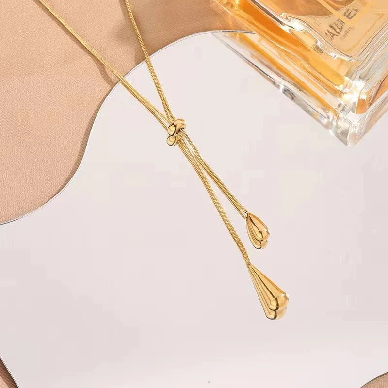 Ensemble collier lariat et boucles d'oreilles
